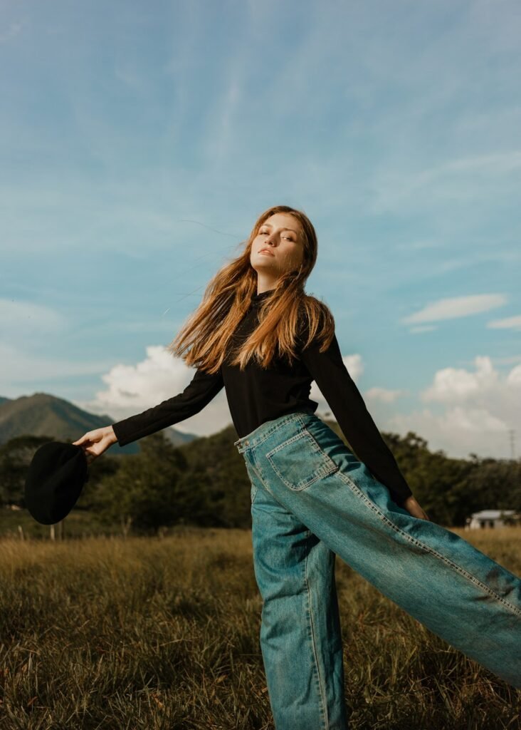 Woman in relaxed casual trousers and denim styling